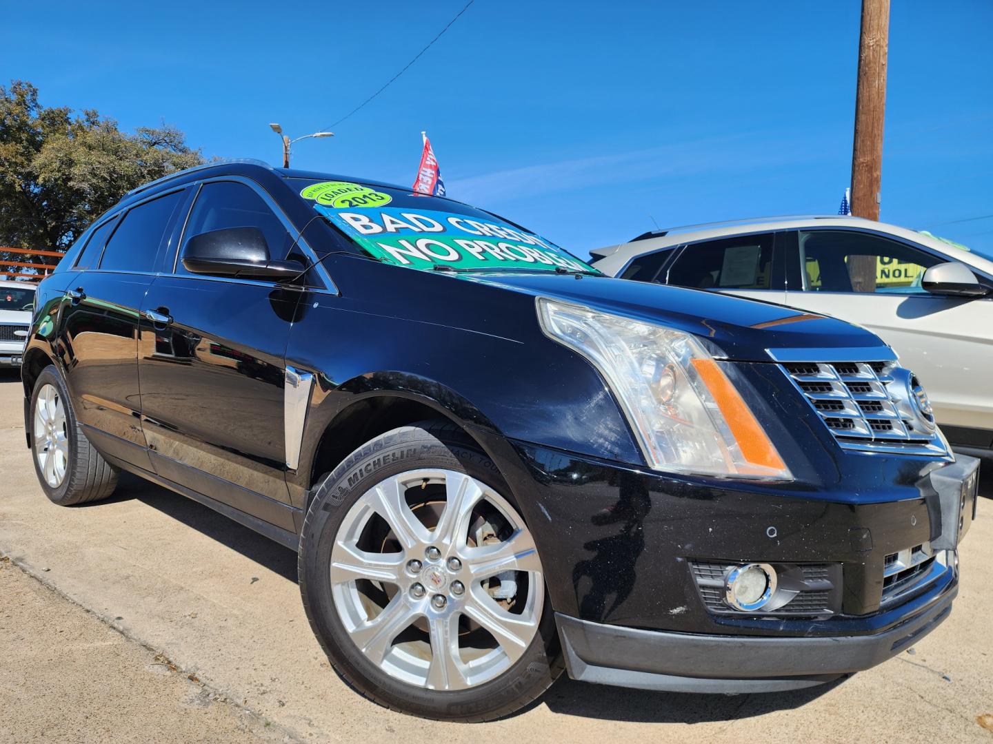 2013 BLACK Cadillac SRX PERFORMANCE COLLECTION (3GYFNDE33DS) with an V6 engine, AUTO transmission, located at 2660 S.Garland Avenue, Garland, TX, 75041, (469) 298-3118, 32.885551, -96.655602 - Welcome to DallasAutos4Less, one of the Premier BUY HERE PAY HERE Dealers in the North Dallas Area. We specialize in financing to people with NO CREDIT or BAD CREDIT. We need proof of income, proof of residence, and a ID. Come buy your new car from us today!! This is a Loaded 2013 CADILLAC SRX CO - Photo#0